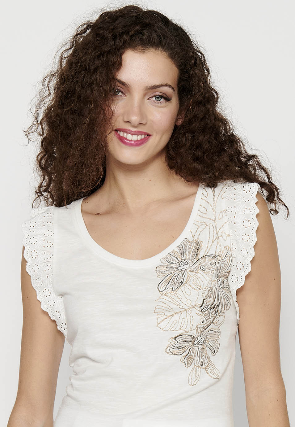 Camiseta sin mangas top de algodón con volantes en los hombros y detalle delantero para mujer | moda actual
