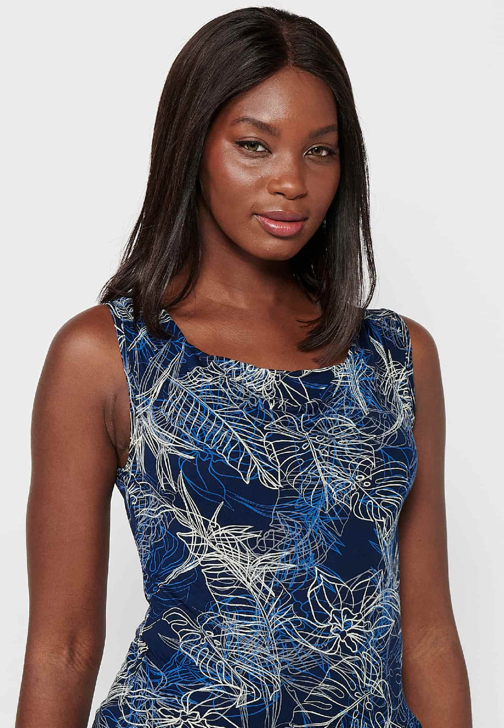 Camiseta sin mangas de cuello barca y estampado floral para mujer | moda actual