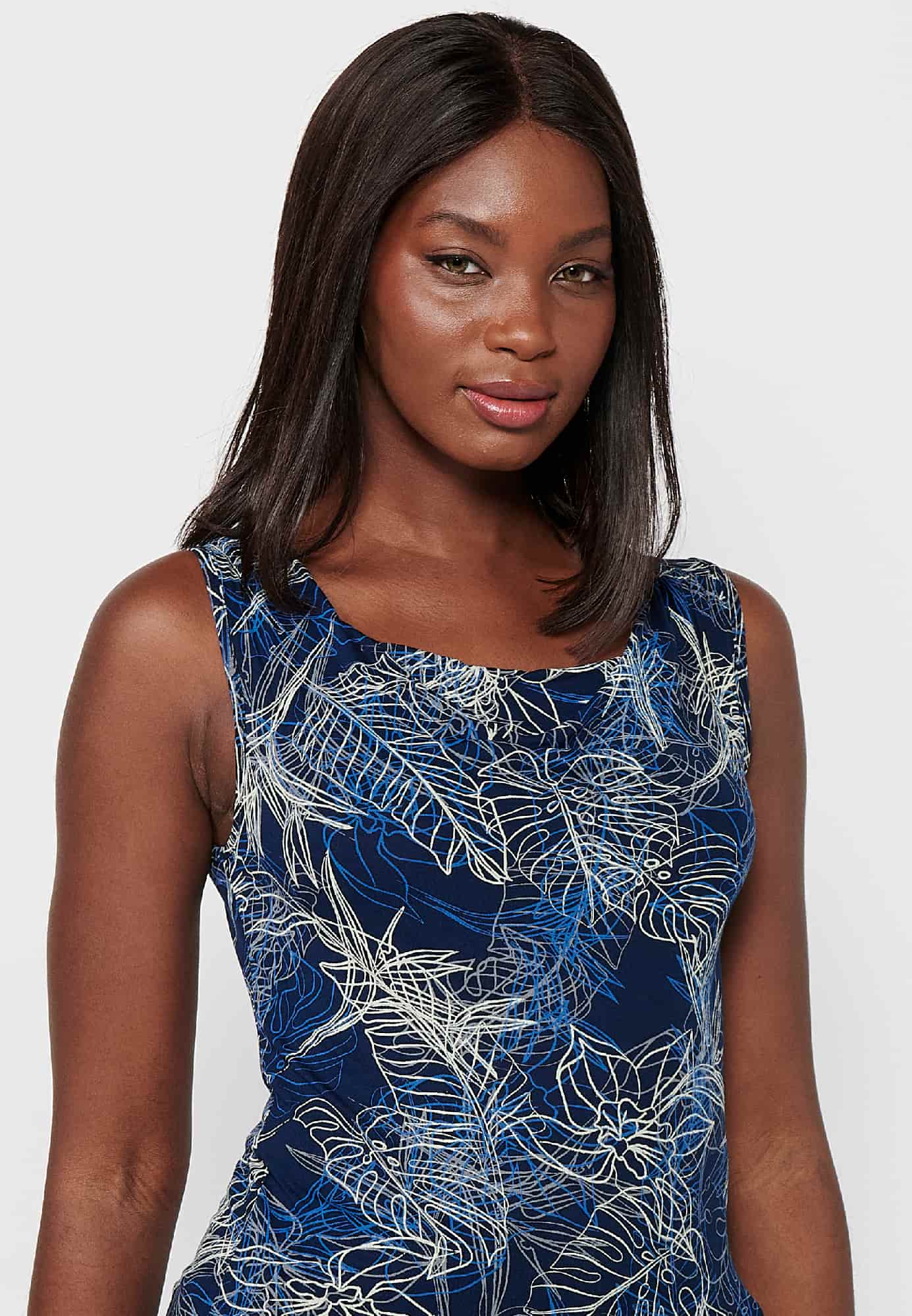 Camiseta sin mangas de cuello barca y estampado floral para mujer | moda actual