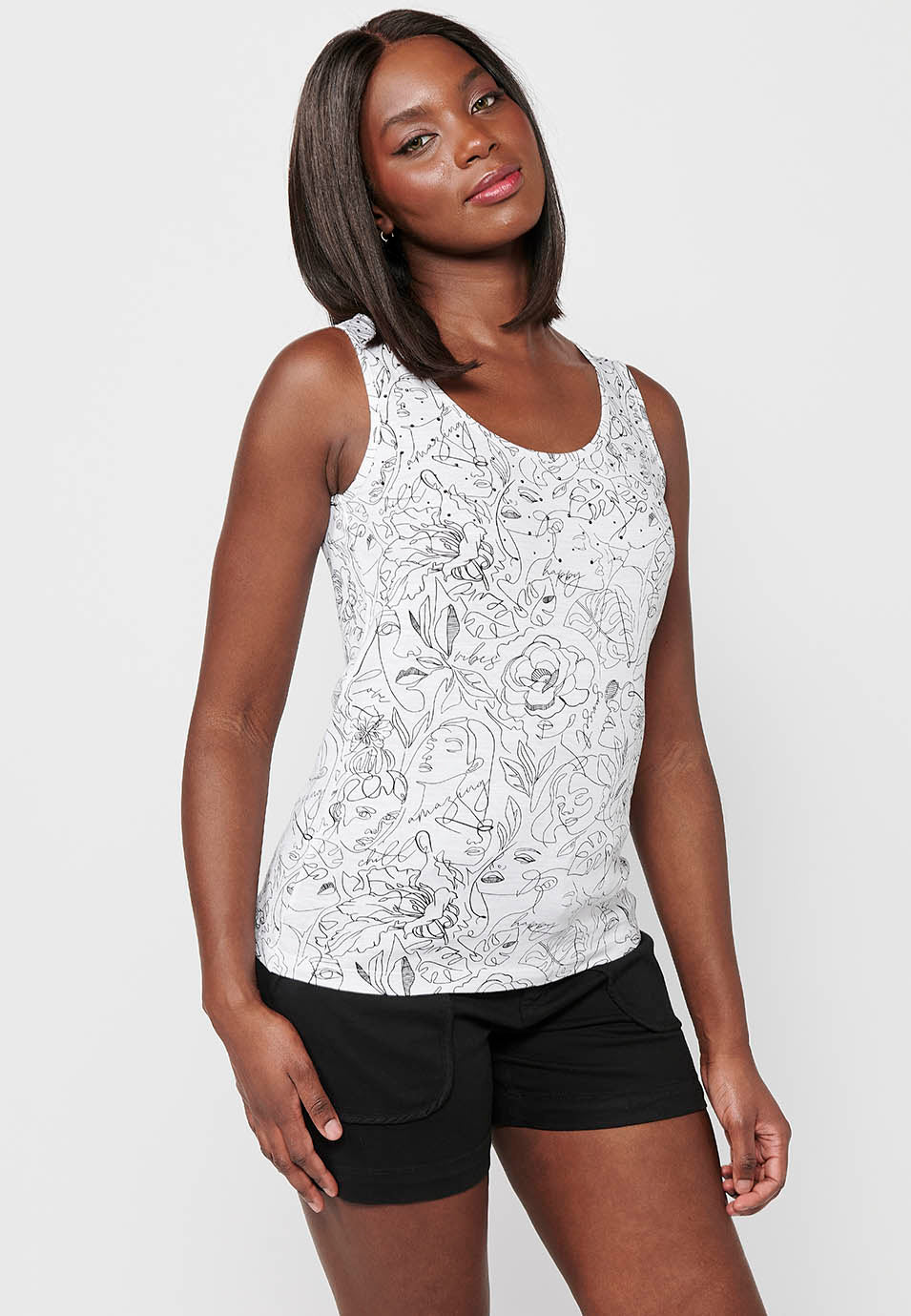 Camiseta sin mangas de algodón con escote redondo con estampado floral para mujer | moda actual