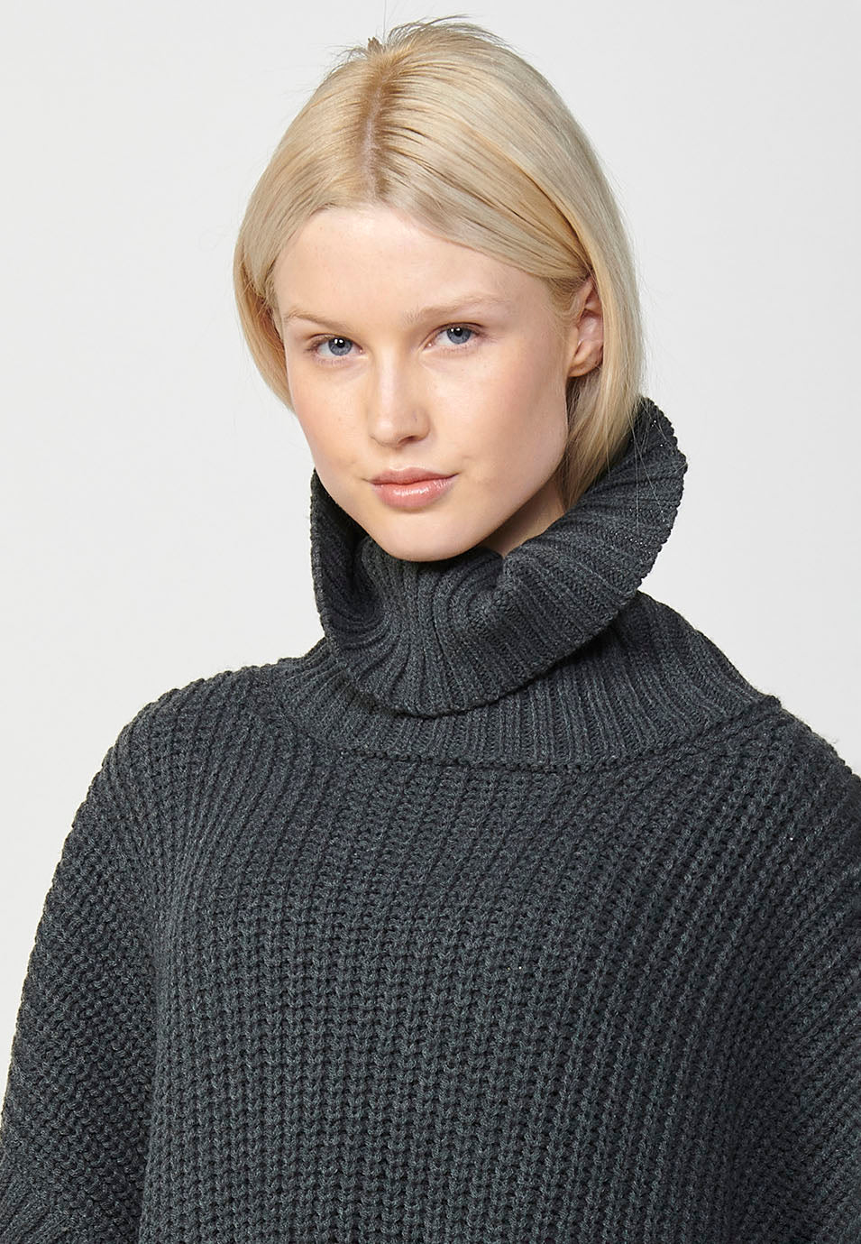 Jersey punto cuello alto tricot capa con bolsillos de plastrón delanteros mujer