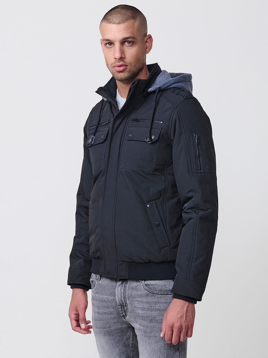 Chaqueta cazadora acolchada hombre con capucha, bolsillos y cierre cremallera.