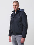 Chaqueta cazadora acolchada hombre con capucha, bolsillos y cierre cremallera.