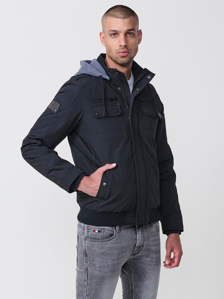 Chaqueta cazadora acolchada hombre con capucha, bolsillos y cierre cremallera.
