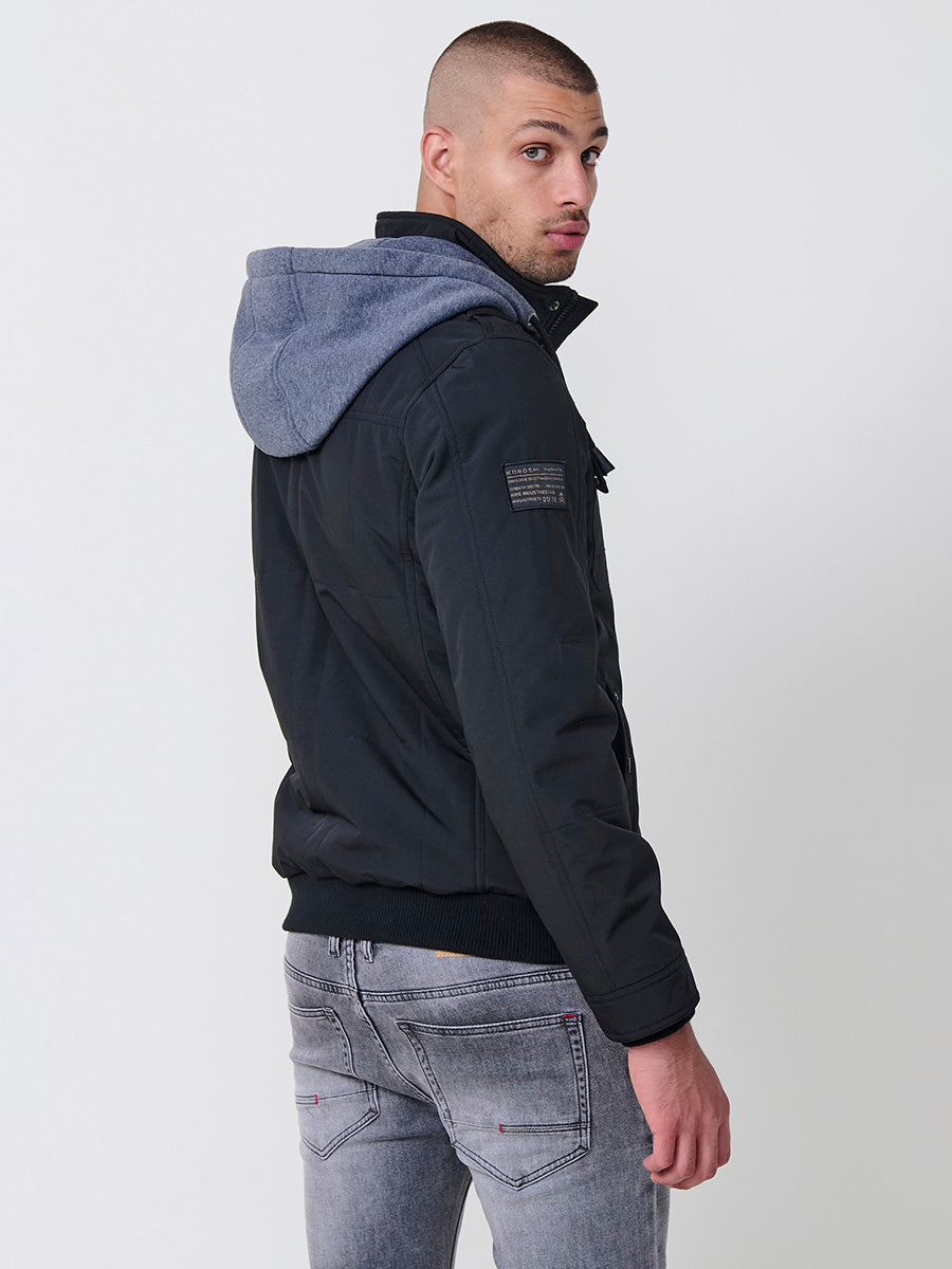 Chaqueta cazadora acolchada hombre con capucha, bolsillos y cierre cremallera.
