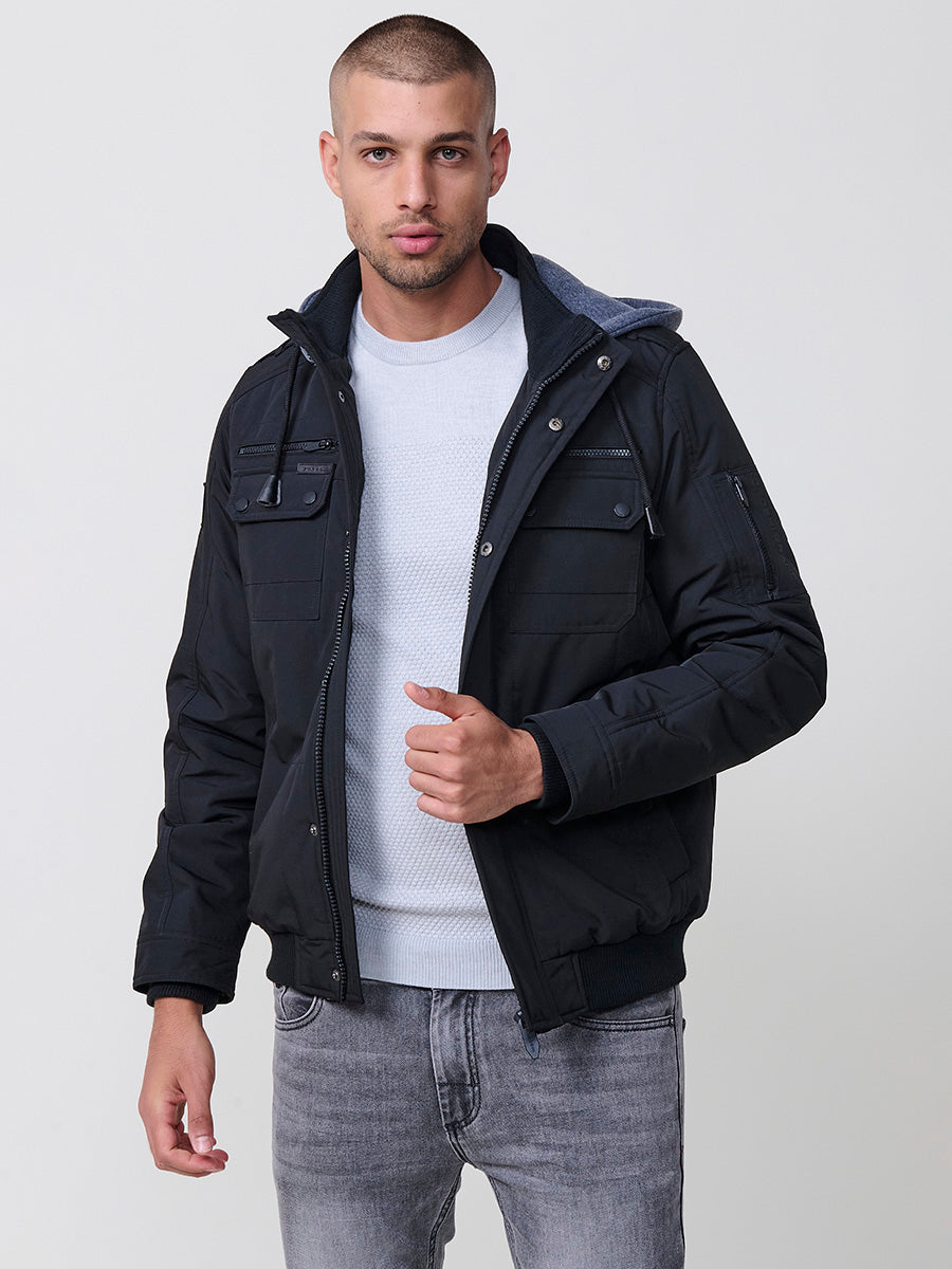 Chaqueta cazadora acolchada hombre con capucha, bolsillos y cierre cremallera.