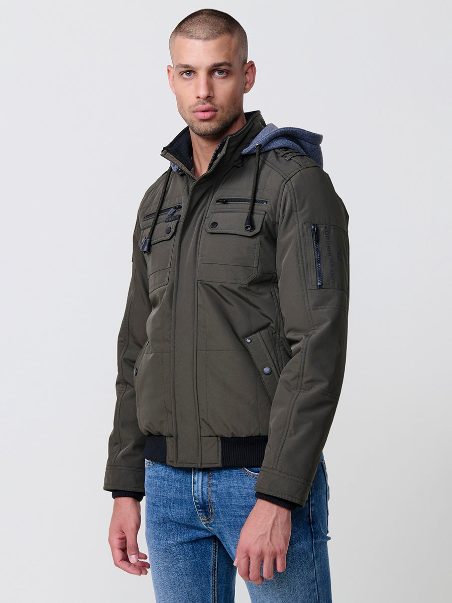 Chaqueta cazadora acolchada hombre con capucha, bolsillos y cierre cremallera.