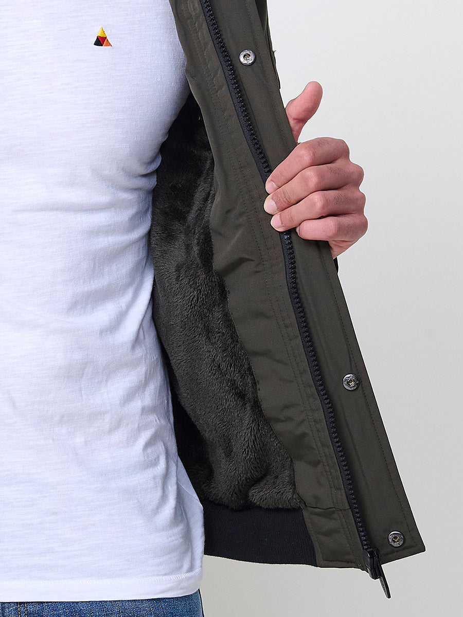 Chaqueta cazadora acolchada hombre con capucha, bolsillos y cierre cremallera.