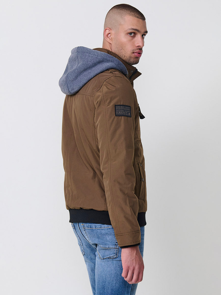 Chaqueta cazadora acolchada hombre con capucha, bolsillos y cierre cremallera.