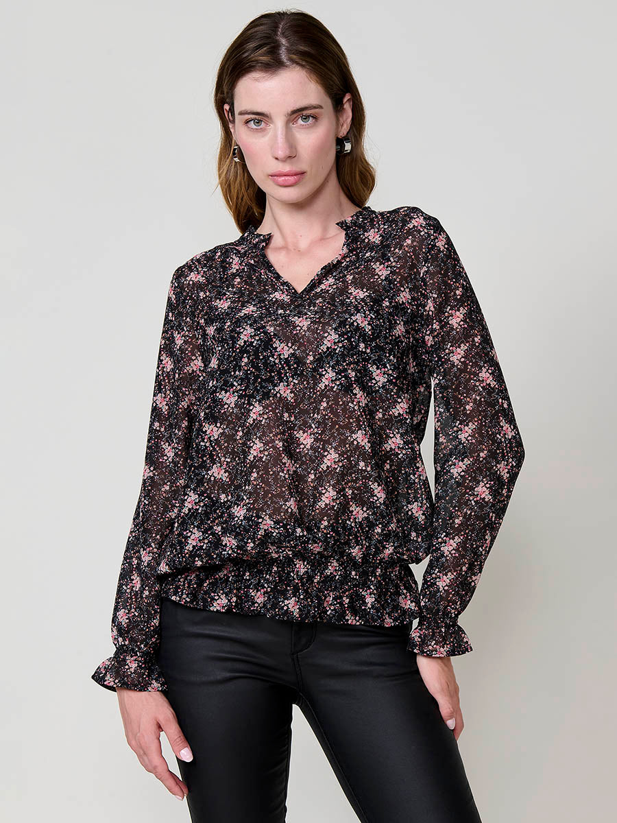 Blusa manga larga mujer semitransparente estampado floral , escote pico y puños engomados.
