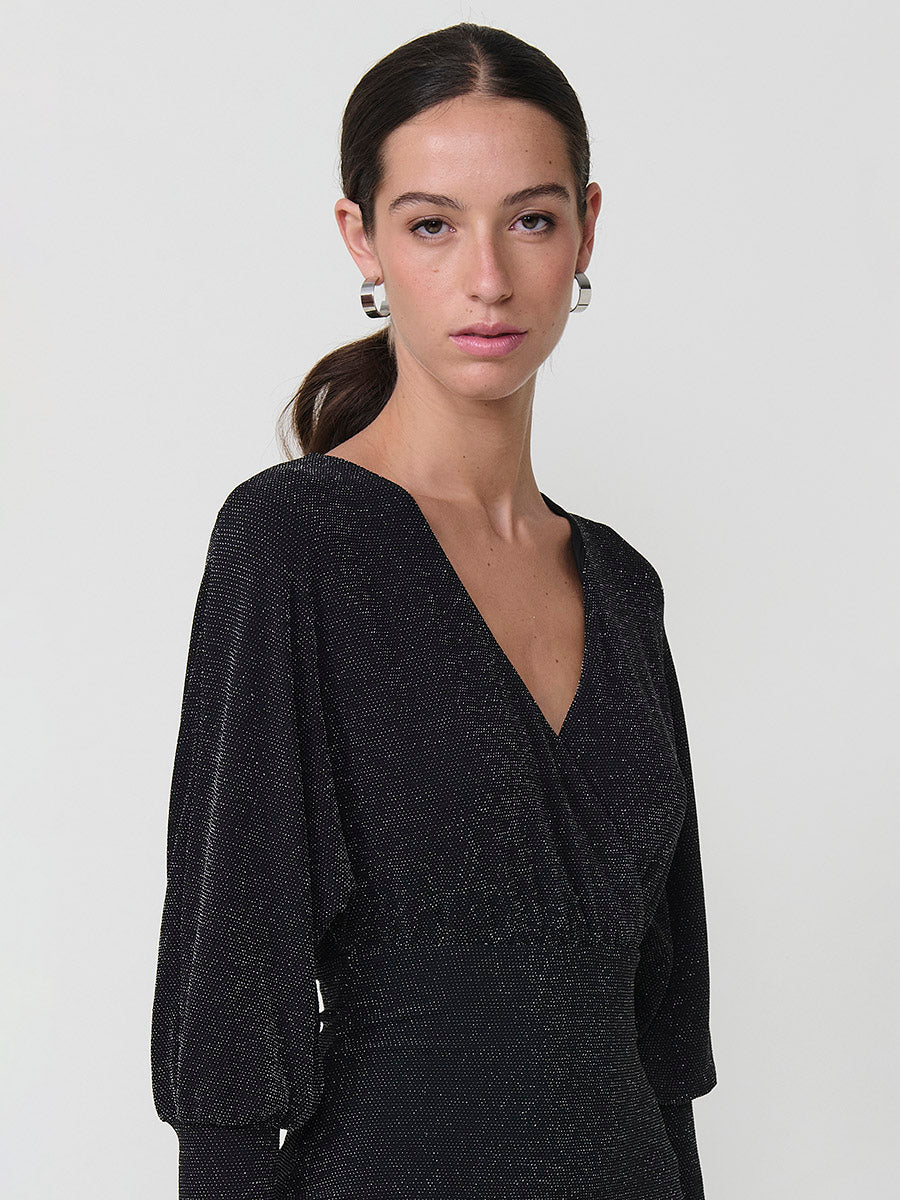 Vestido corto elástico brillante manga larga abullonada mujer