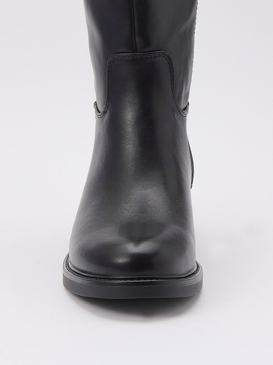 Calzado mujer tipo bota plana caña alta efecto piel, estilo montar, hebilla decorativa, cremallera interior y forro efecto pelo.