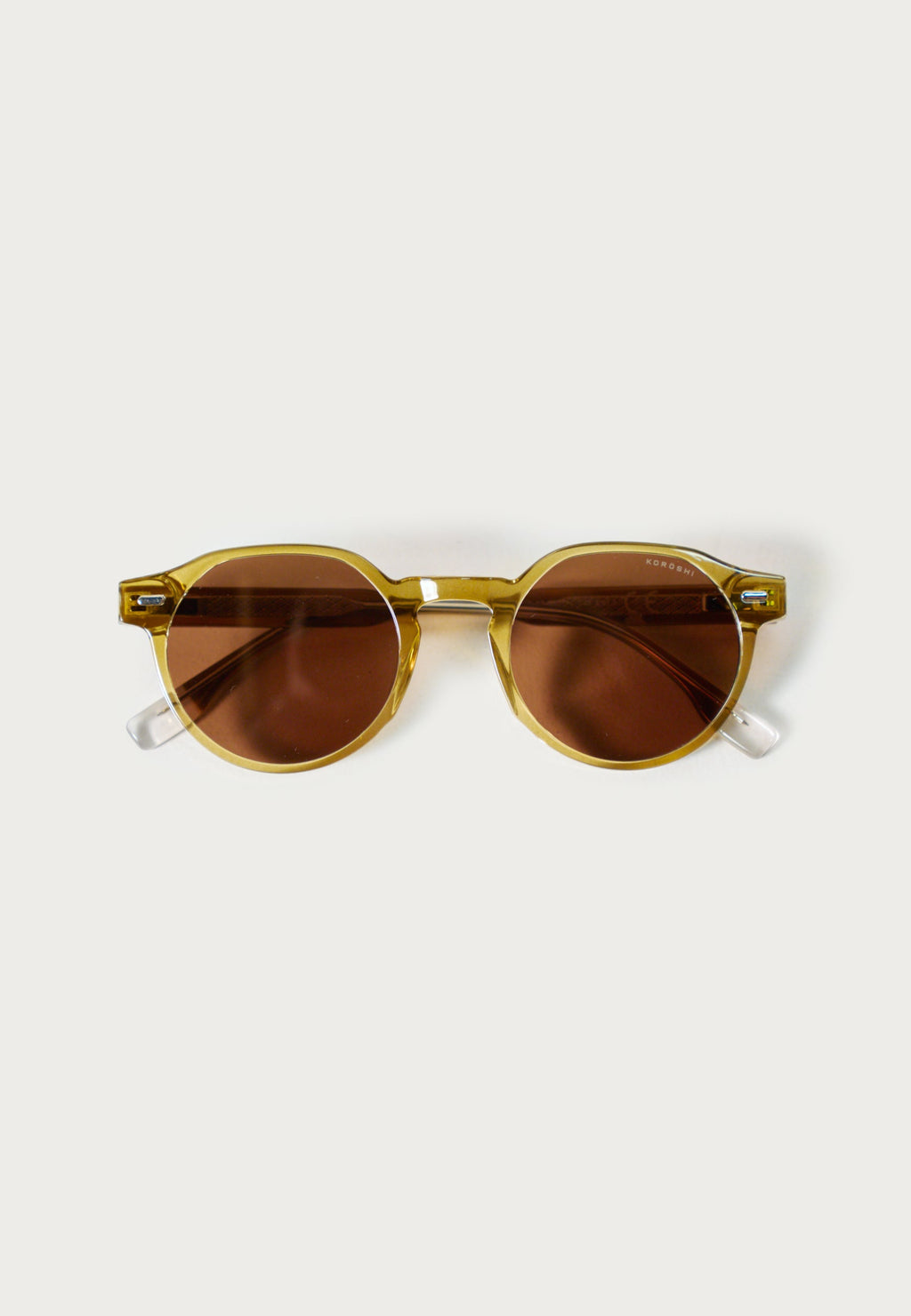 Gafas de Sol Unisex Ovaladas Bronce Lentes Degradadas Montura Transparente Prot. UV – KOROSHI