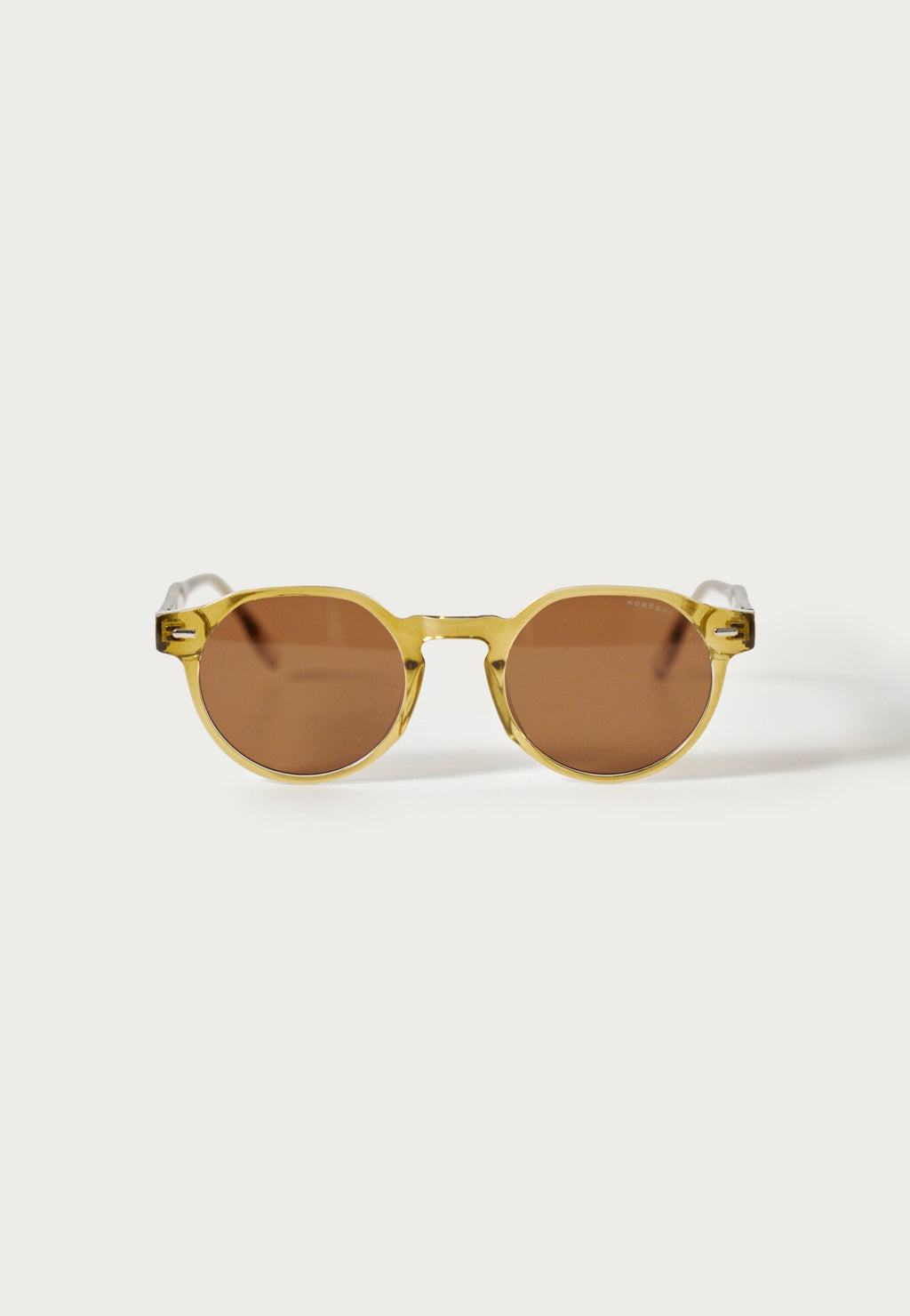 Gafas de Sol Unisex Ovaladas Bronce Lentes Degradadas Montura Transparente Prot. UV – KOROSHI