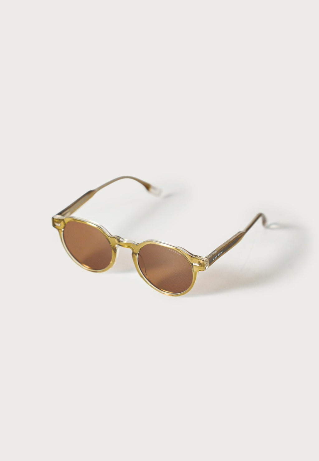 Gafas de Sol Unisex Ovaladas Bronce Lentes Degradadas Montura Transparente Prot. UV – KOROSHI