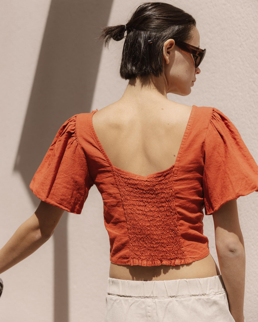 Top Manga Abullonada Escote Espalda Naranja