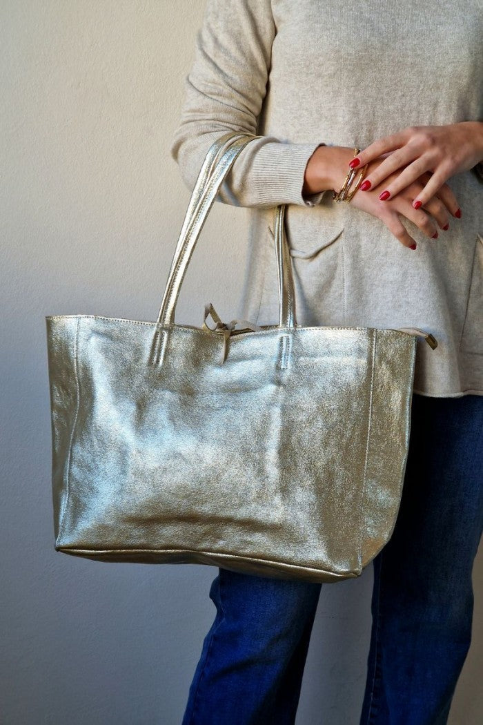 Bolso shopping con cremallera dorado