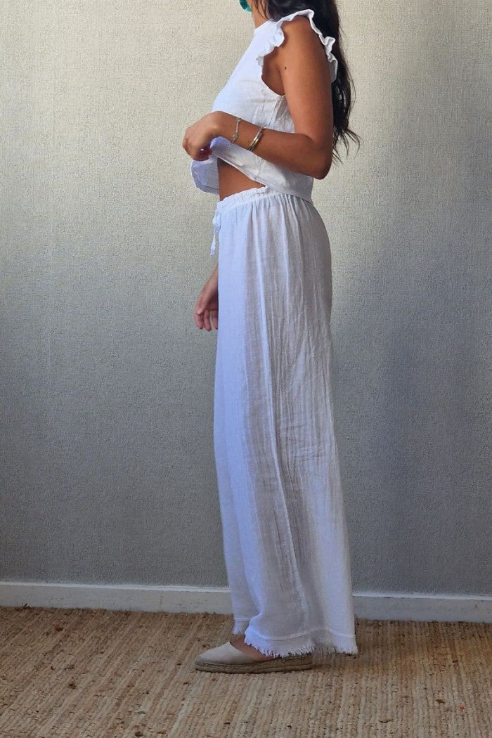 Pantalón tipo lino flecos blanco
