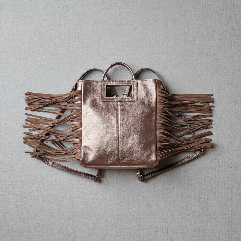 Bolso de piel con flecos cobre metalizado