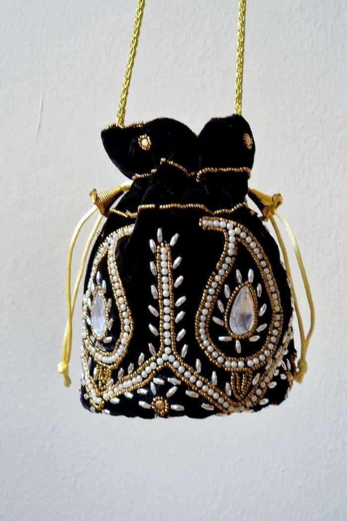 Bolso bombonera negro y dorada