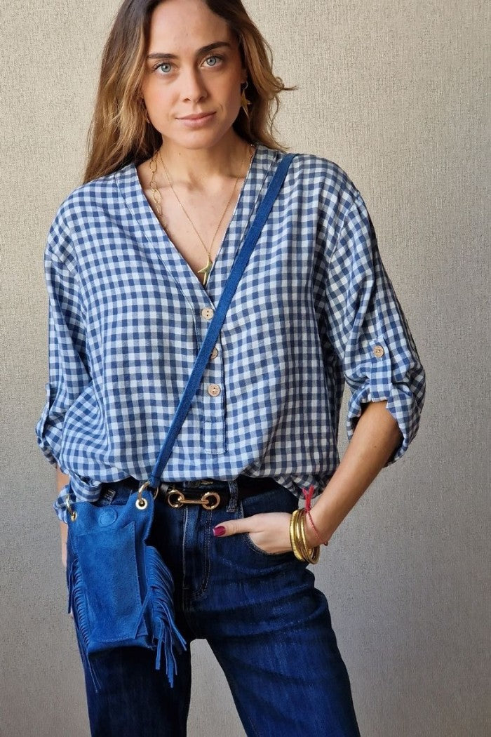 Bolso mini de ante y flecos azul