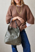 Bolso de piel trenzada verde