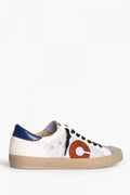 Zapatillas blancas, azul y naranja con detalles en plata