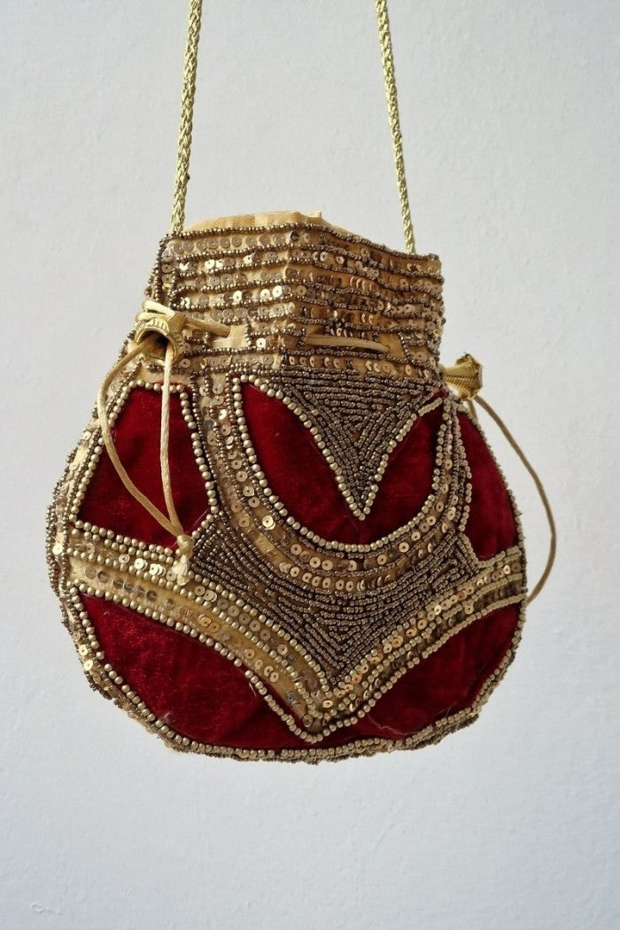 Bolso bombonera granate y dorada
