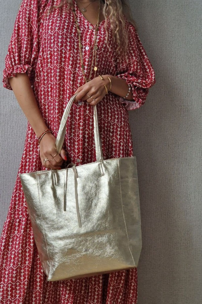 Bolso de piel dorado con opción de personalizar