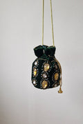 Bolso bombonera verde con piedras