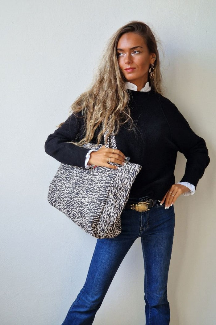 Bolso de tela acolchado con estampado animal print